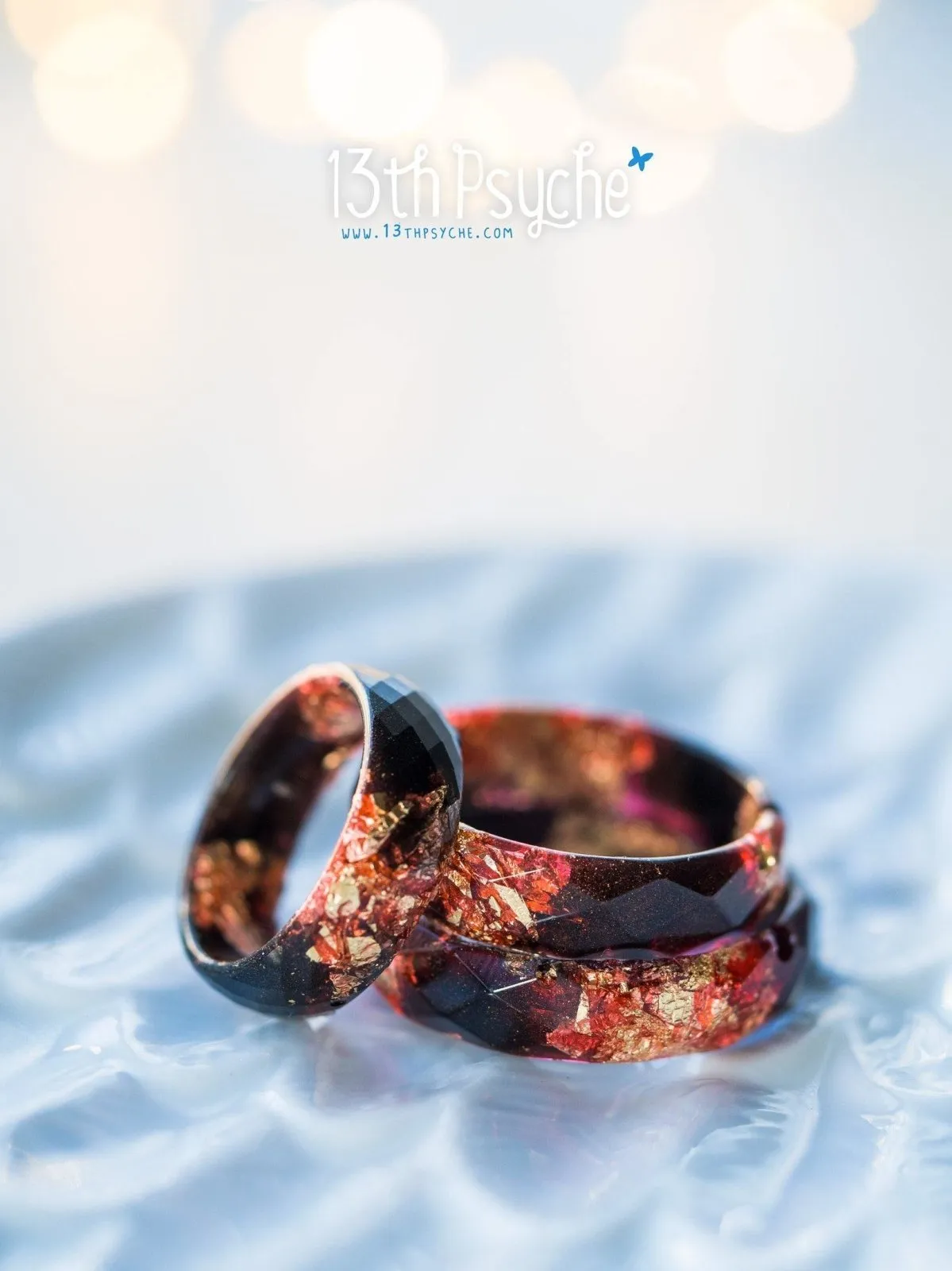 Black and red faceted resin ring with gold flakes