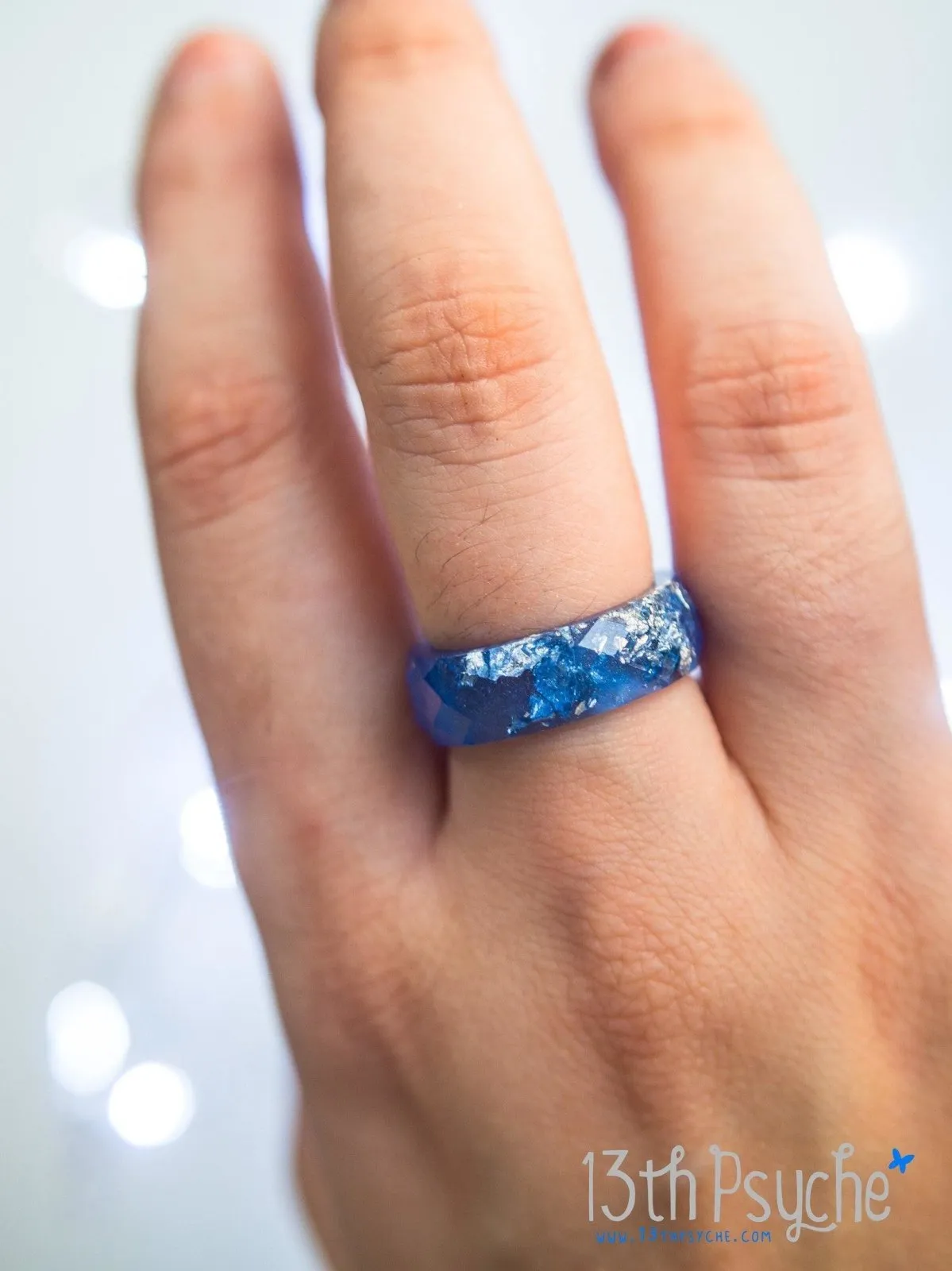 Blue and silver flakes faceted resin ring