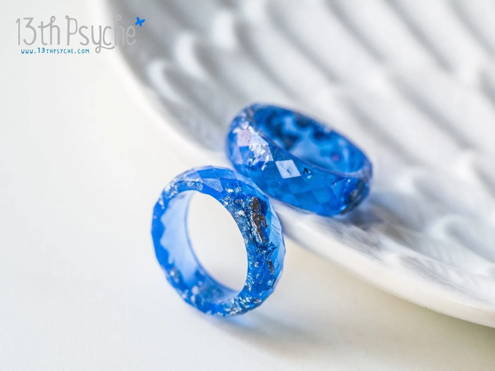 Blue and silver flakes faceted resin ring