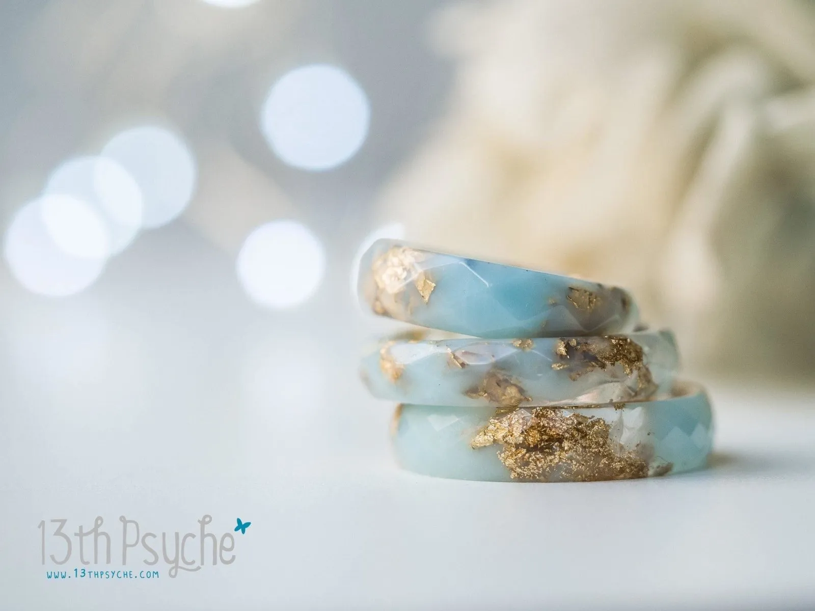 Clear and Pale blue faceted resin ring with gold flakes