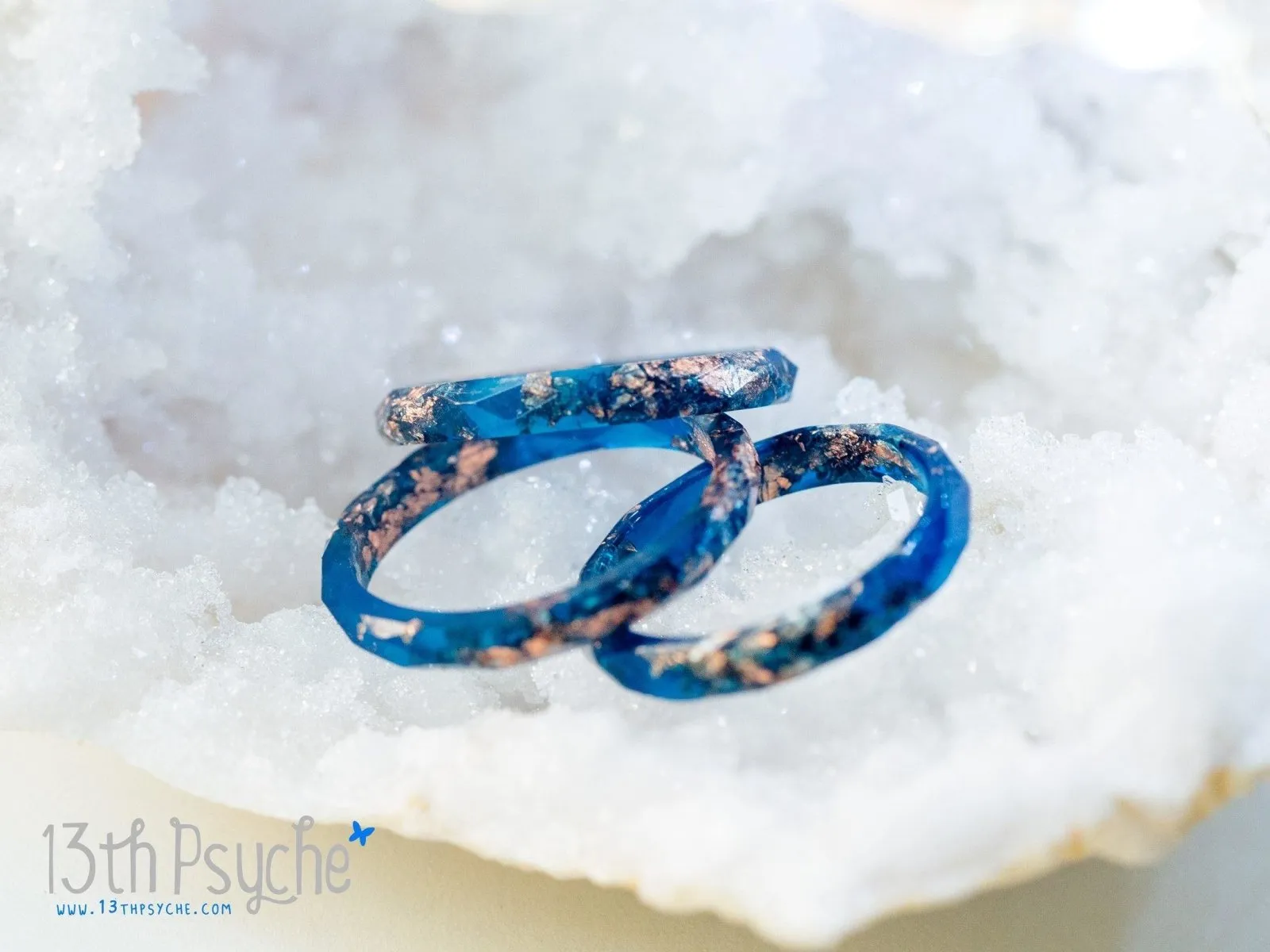 Dark blue and rose gold flakes faceted resin ring