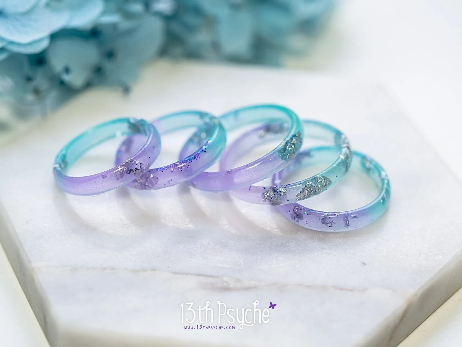 Lilac and turquoise resin ring with silver flakes