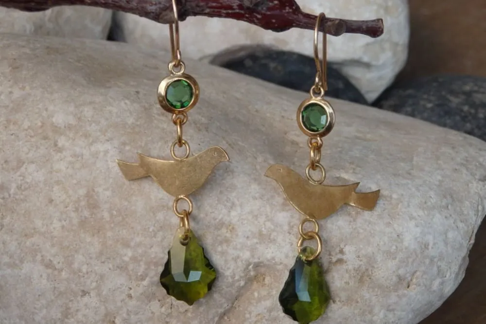 Pigeon gold dangle earrings