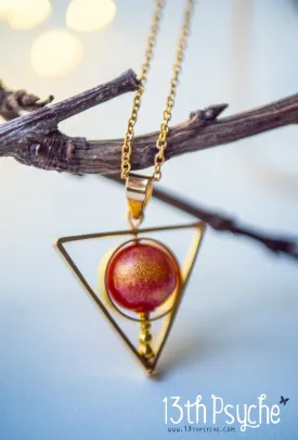 Sun star inspired triangle spinner necklace