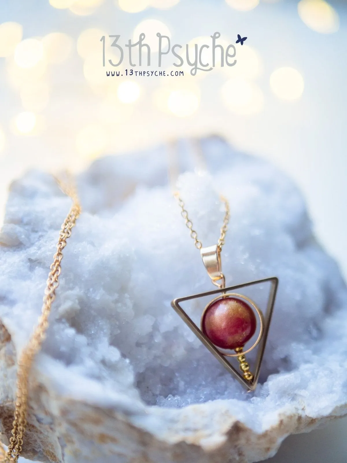 Sun star inspired triangle spinner necklace