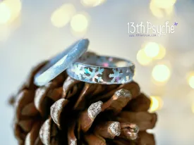 Winter inspired snowflake and white glitter resin ring set of two